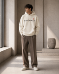Model wearing the off-white KiiNDSOULS Broken Heart heavyweight hoodie, front view