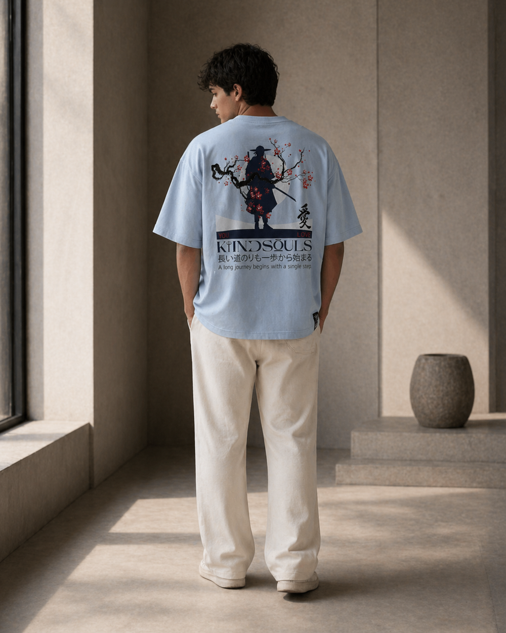 Pale sky blue oversized KiiNDSOULS Samurai T-shirt, model lifestyle view